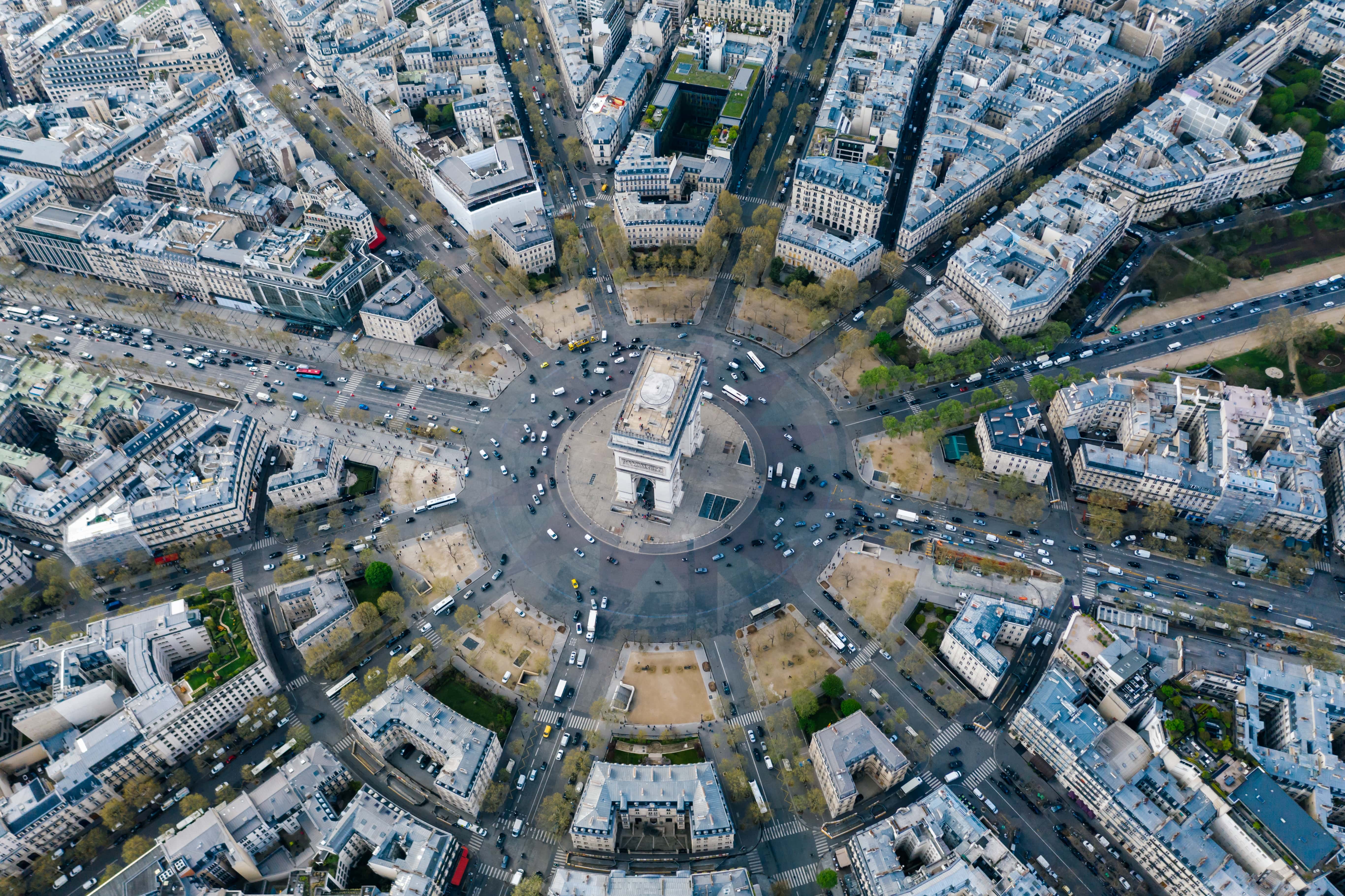 Arc de Triomphe monument in Paris, with people exploring EOR opportunities in France