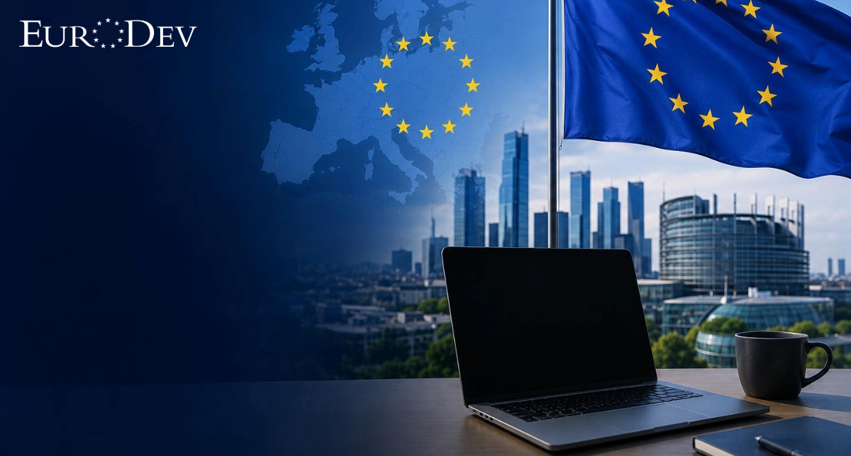 EU flag, laptop and modern European business district representing software market expansion in Europe