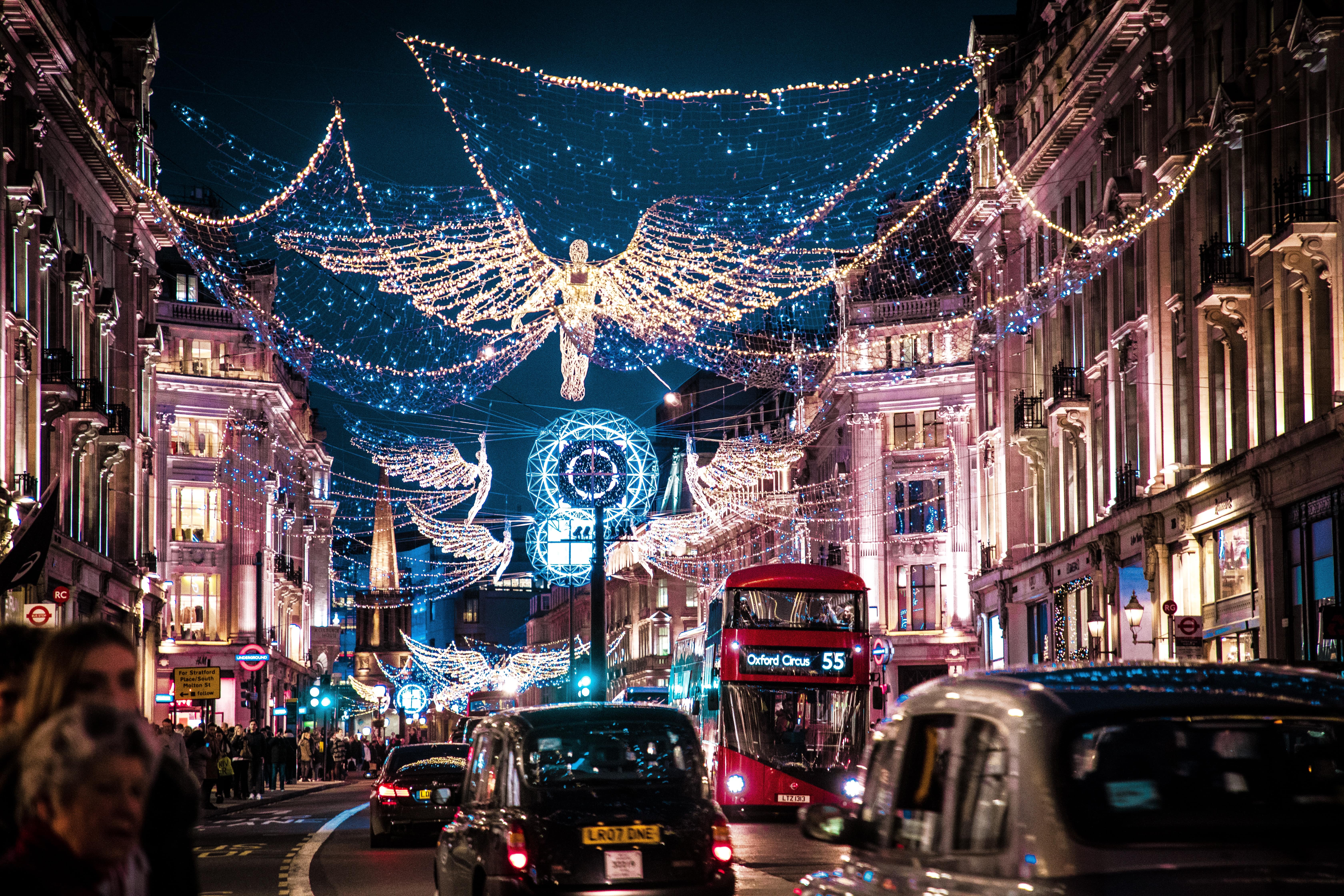 London night street view with symbolic red bus, UK business expansion