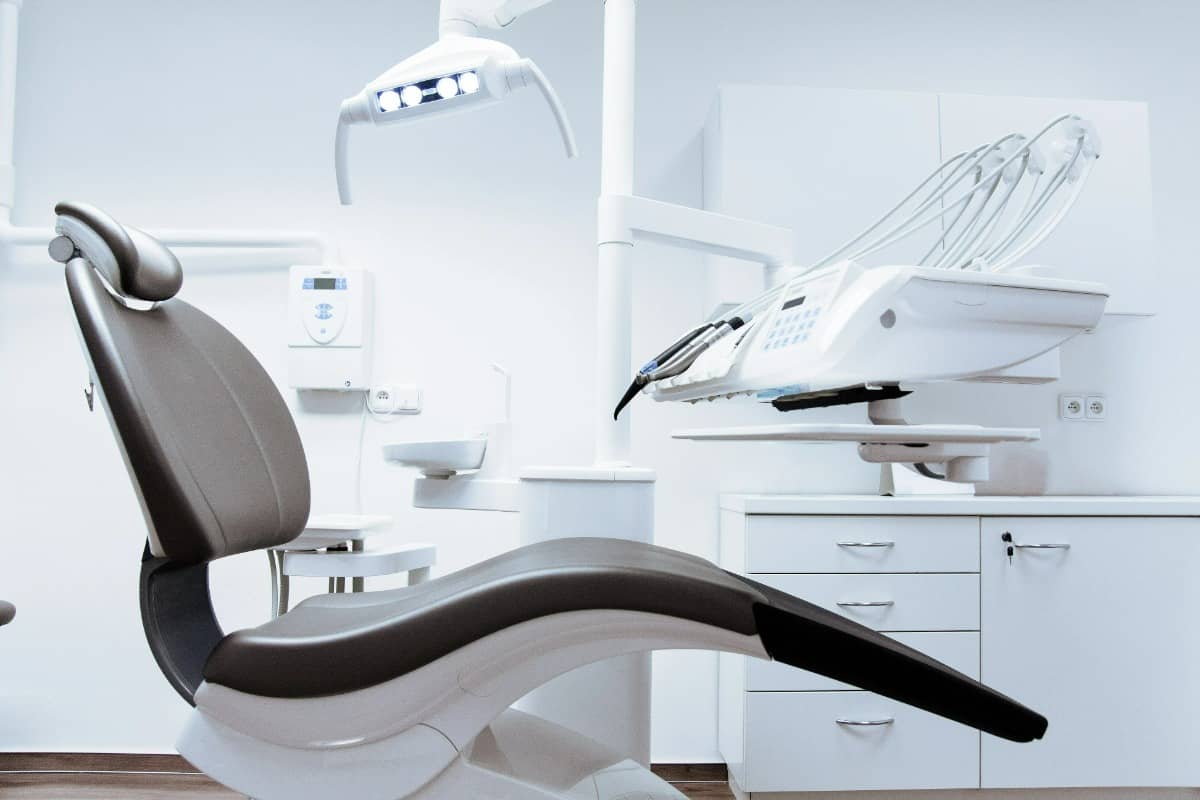 dental chair in white dentist office